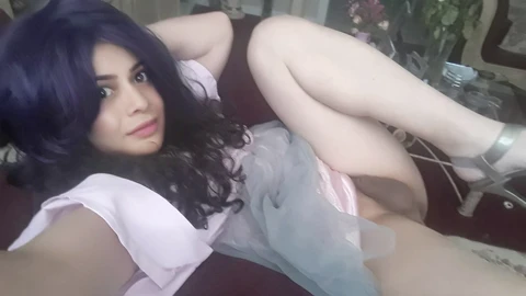Sensual femboy explores pleasure with her delicate nub and enjoys the sensation of a beer bottle penetration on cam.