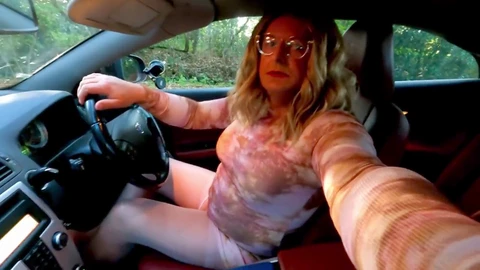 Sexy crossdresser Kellycd2022, a mature MILF, enjoys a naughty car ride, jerking off and peeing through her stockings in panties, all outdoors